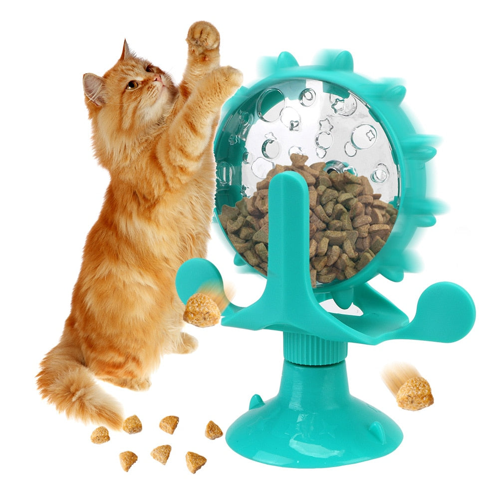 Interactive pet feeding wheel with cat reaching for kibble, promoting active play and feeding engagement.